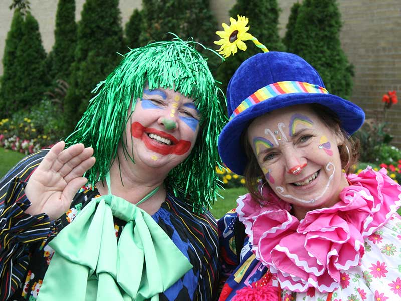 Be-Bop and Sookie the Clown are hamming it up for the Cameras